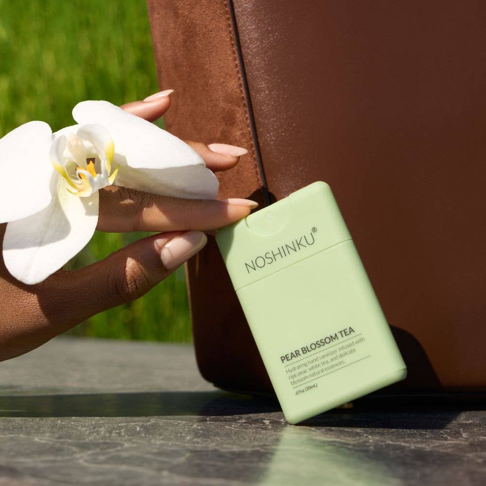 Noshinku - Refillable Pear Blossom Tea Hydrating Pocket Hand Sanitizer - The Look and Co