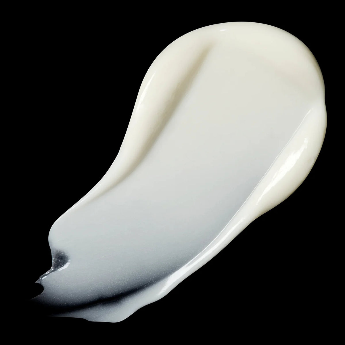 White cream swatch on a black background