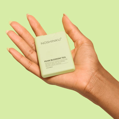 Noshinku - Refillable Pear Blossom Tea Hydrating Pocket Hand Sanitizer - The Look and Co