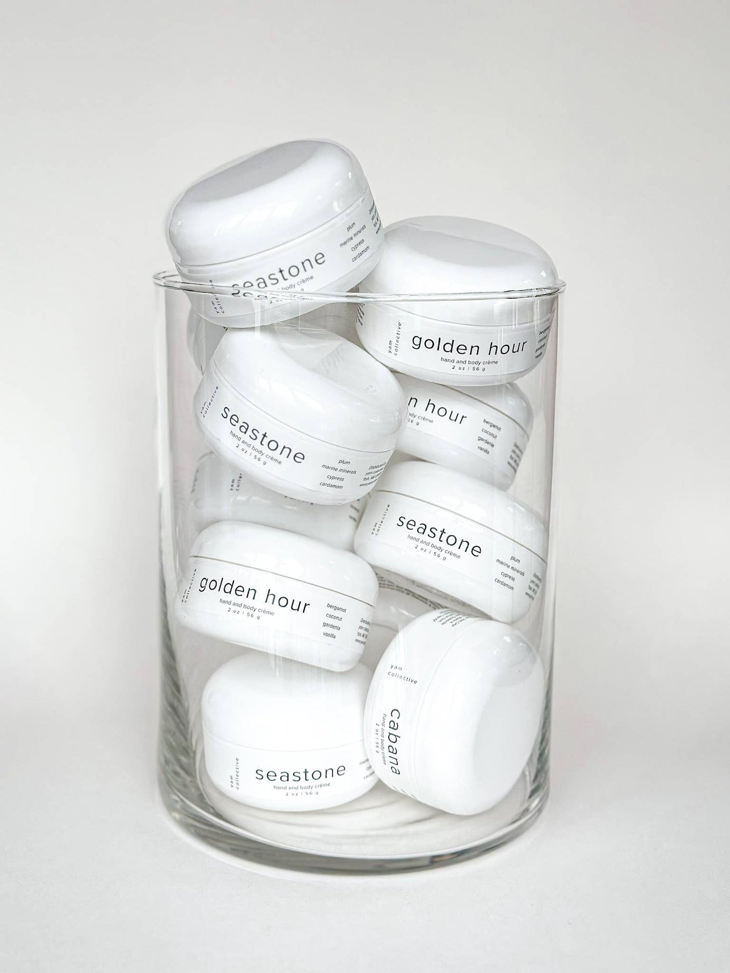 yam collective - Hand + body creme: seastone / plum, marine minerals, cypress - The Look and Co