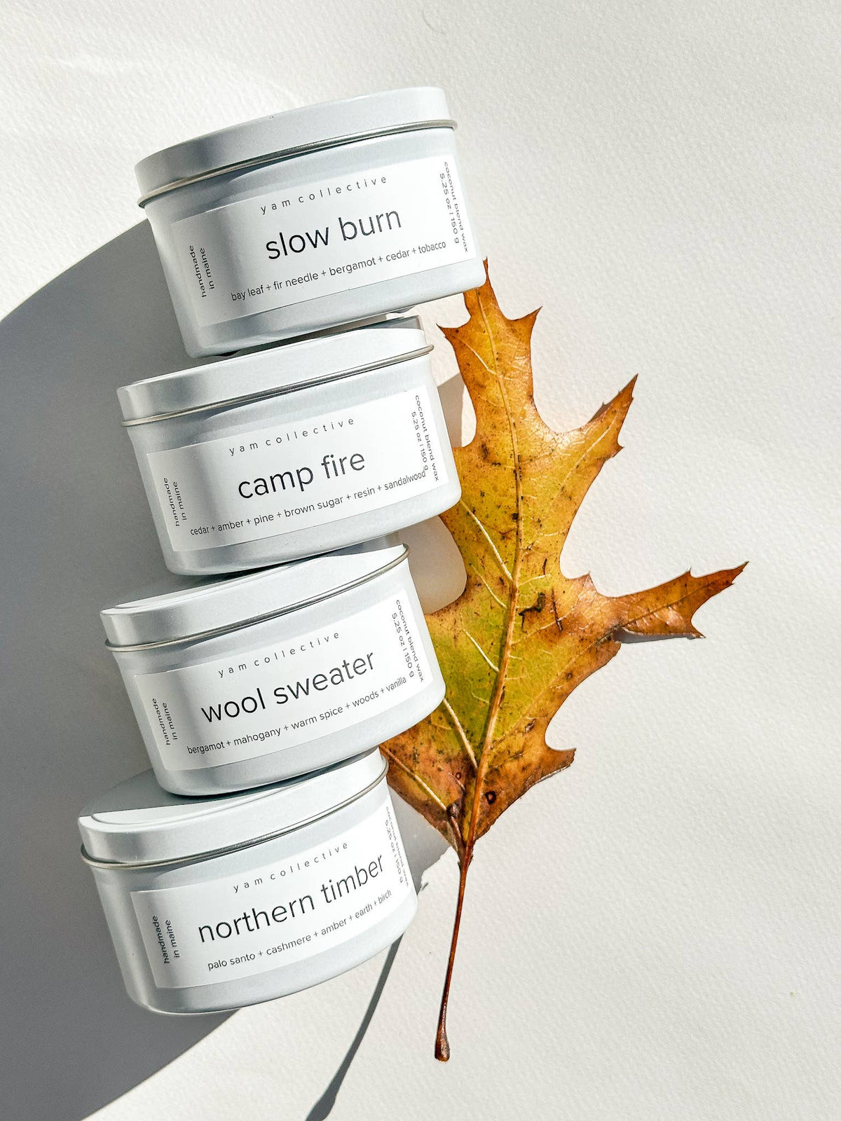 yam collective - Rain Dance - 5 oz Blue Lotus + Driftwood Cream Tin Candle - The Look and Co