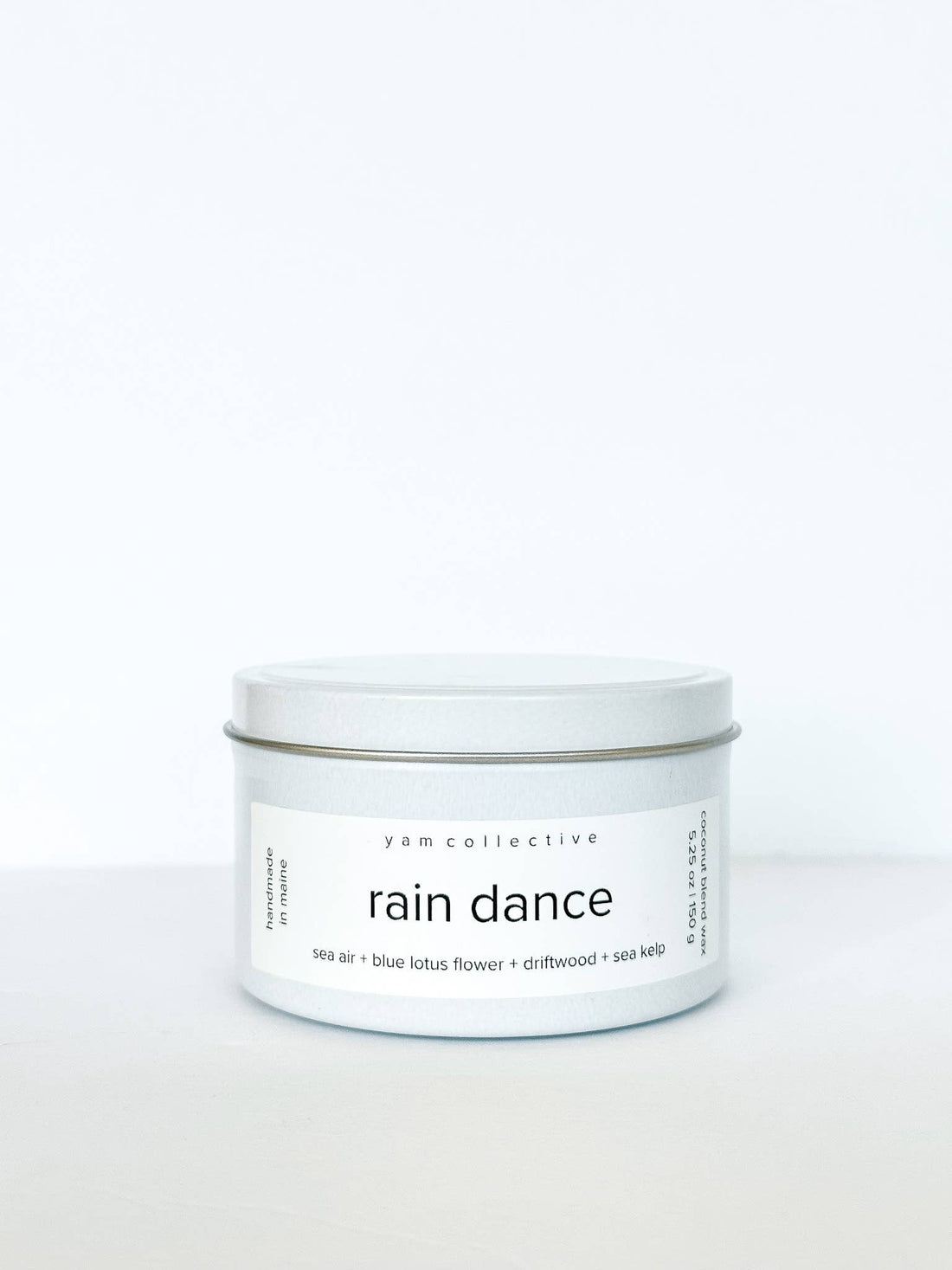 yam collective - Rain Dance - 5 oz Blue Lotus + Driftwood Cream Tin Candle - The Look and Co