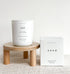 yam collective - Sand - 10 oz Amber + Teakwood Matte White Glass Candle - The Look and Co
